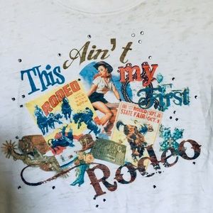 White t-shirt with rhinestone.